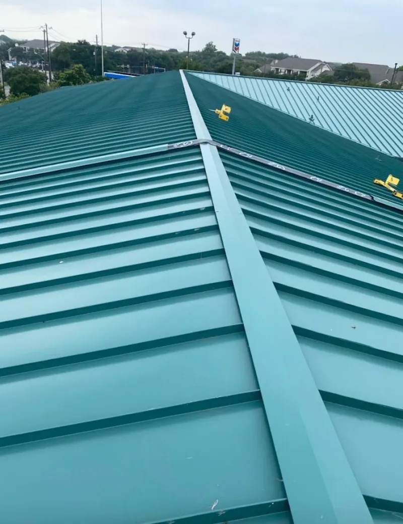 Green commercial metal roof ridge and valley for Metal Roof Repair in Oshkosh