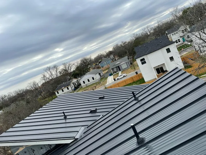 Standing seam metal roof panels with vents for Skylight Repair in Oshkosh